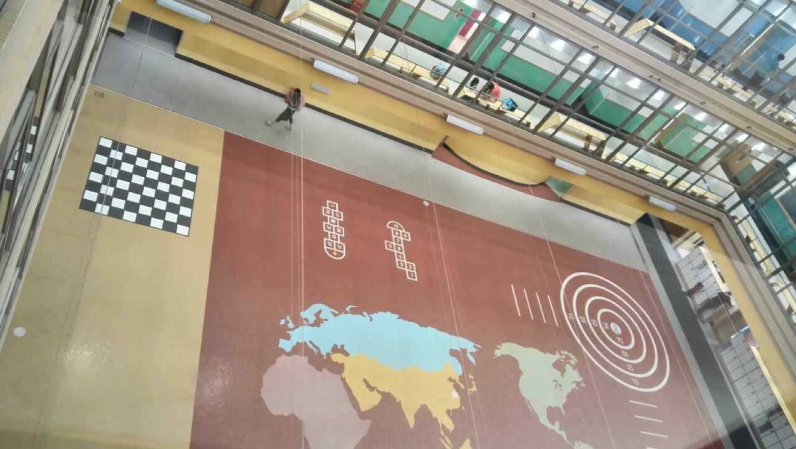 School atrium with interactive floor elements