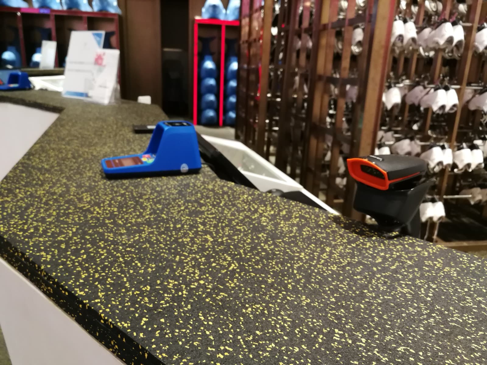 SPORTEC color 15% yellow rubber surface around the skate rental counter